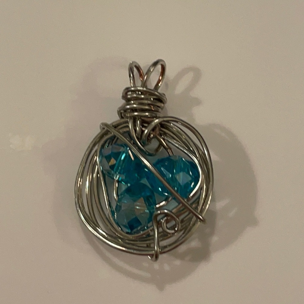 Silver tone pendant